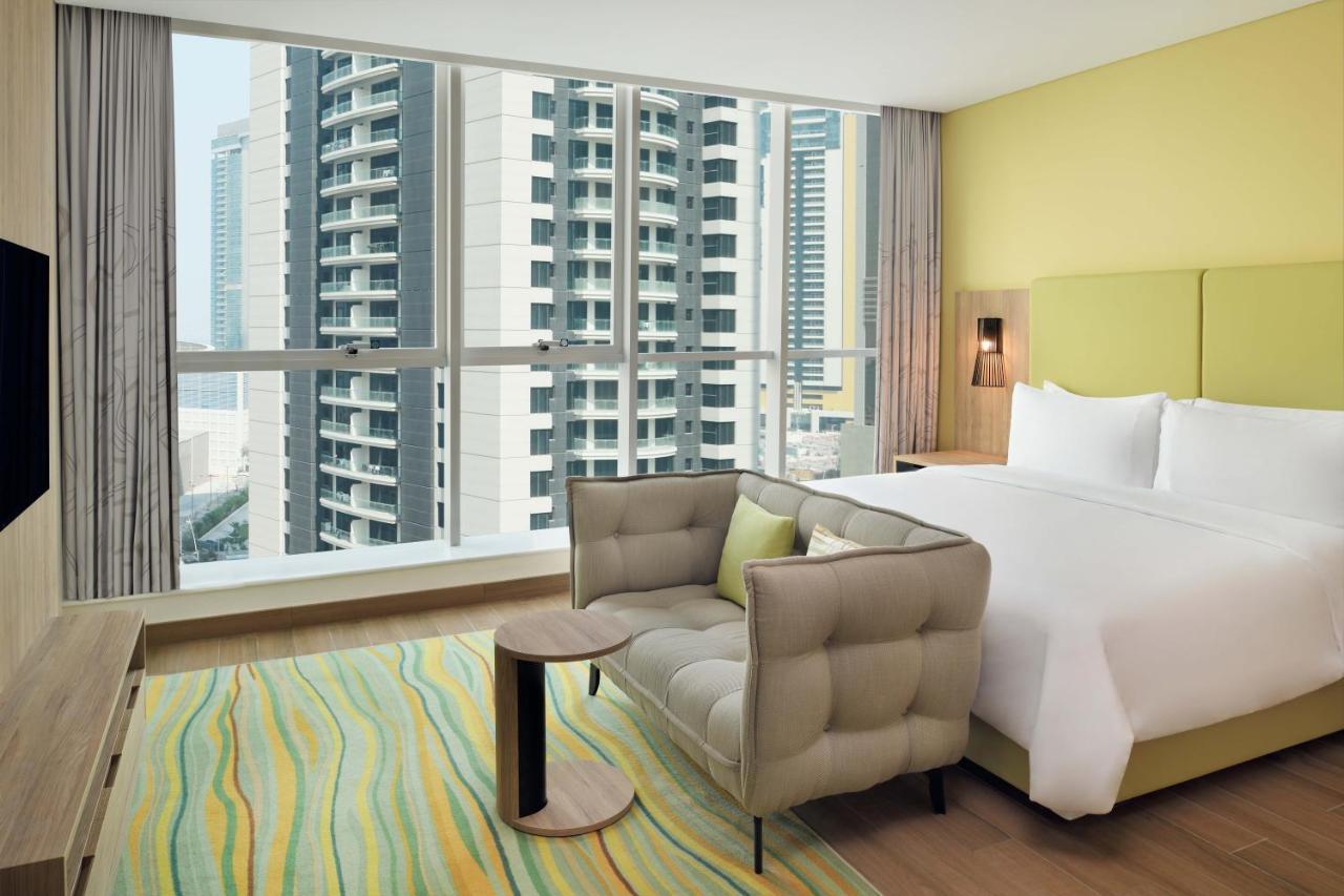 Element By Westin City Center Doha Bagian luar foto A bedroom at the hotel